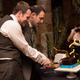 Razavi and his husband cutting their wedding cake